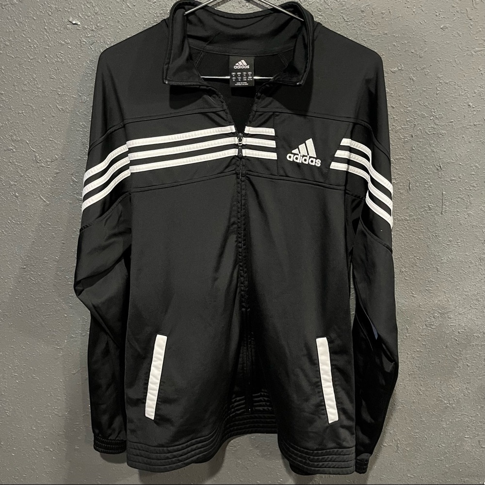 Women’s adidas zip up jacket.